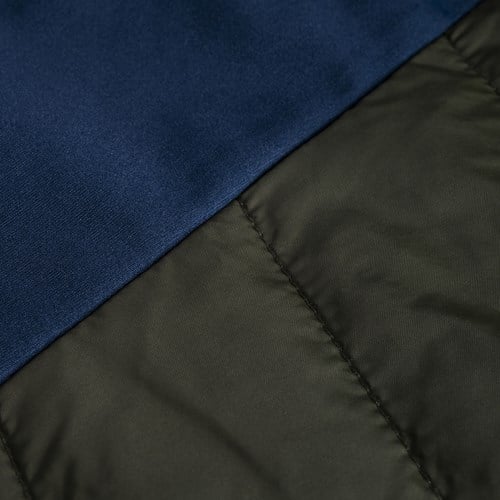 A close up of a blue fabric.