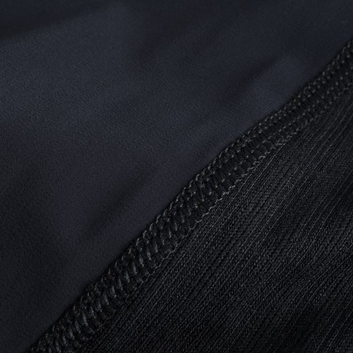 A close up of a black fabric.